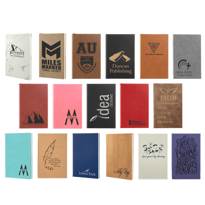 Collection of leatherette journals all personalized with various custom designs and logos in 17 different colors.