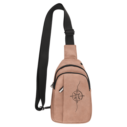Blush colored leatherette sling bag with a laser engraved abstract star design on the front.