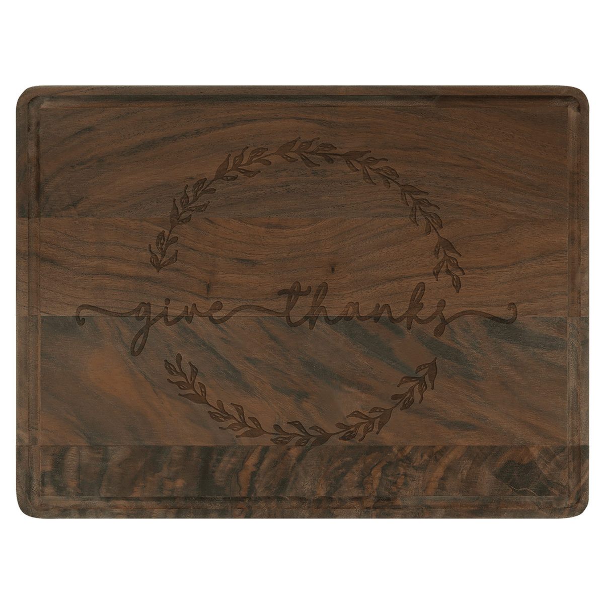 Personalized walnut cutting board with drip ring and laser-engraved 'give thanks' design.