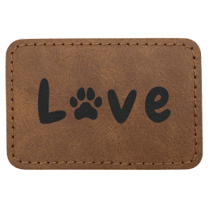 Dark brown faux-leather patch with rounded corners and stitched edges, featuring the word 'Love' engraved in black with a paw print replacing the letter "o"