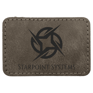 A rectangular dark gray textured leather patch with stitched edges, featuring a black Starpoint Systems logo and text on a plain white background.