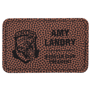 Brown football-textured leatherette patch with laser-engraved "Amy Landry Booster Club President" text and graphic