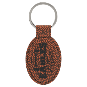 Football textured keychain with 'Eagles Mom' and football engraved on it, on a white background