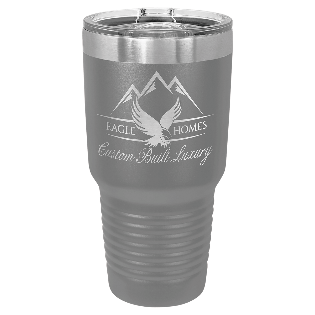 Custom laser-engraved 30 oz grey insulated tumbler featuring 'Eagle Homes Custom Built Luxury' logo, shown on a transparent background.