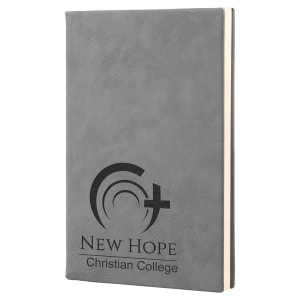 Custom laser-engraved Grey leatherette journal featuring the logo for New Hope Christian College for a professional, personalized look.