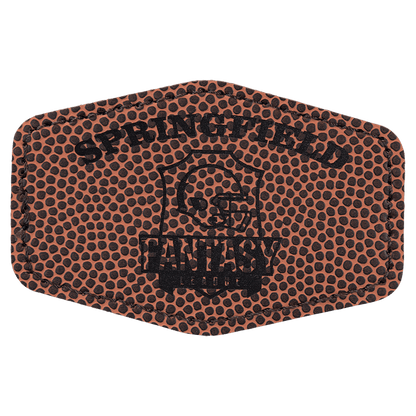 A brown football-textured leatherette hexagon patch with black stitched edges, featuring the text "SPRINGFIELD FANTASY LEAGUE" and a football helmet shield logo.