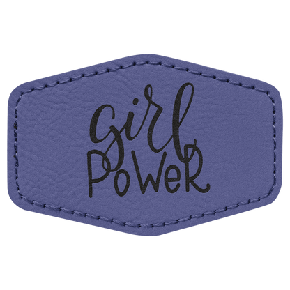 A purple leatherette hexagon patch with black stitched edges, featuring the text 'girl Power' in a playful, handwritten script style.