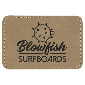 A rectangular tan leather patch with rounded corners, featuring a black line art pufferfish graphic and the text 'Blowfish SURFBOARDS' in black script and block lettering.