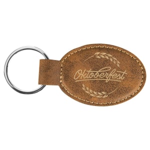 Brown leather keychain with gold 'Oktoberfest' engraving on a white background