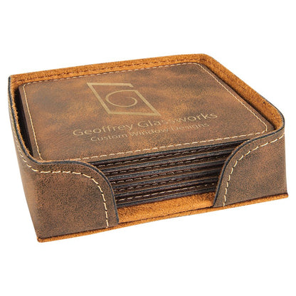 A light brown, rustic-style leatherette coaster set with a matching holder, featuring a gold 'Geoffrey Glassworks' logo laser-engraved in the center.