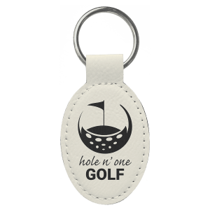 White leather keychain with golf design and text "hole 'n one Golf" on a transparent background